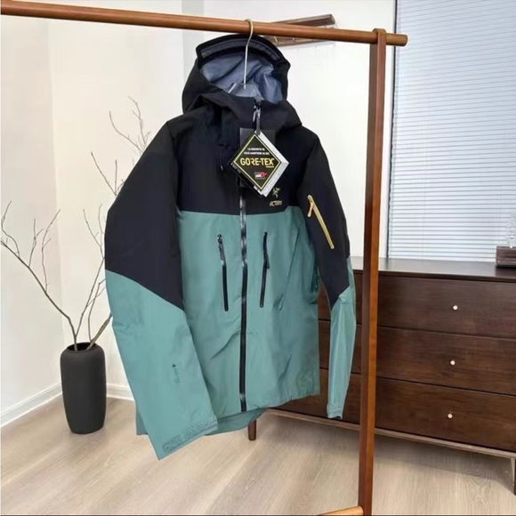 Arc'teryx Men's Black and Teal Performance Jacket - Picture 3 of 7